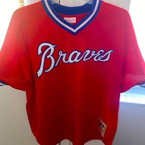 This is a Mitchell & Ness Braves mesh jersey. It’s in excellent condition 10/10